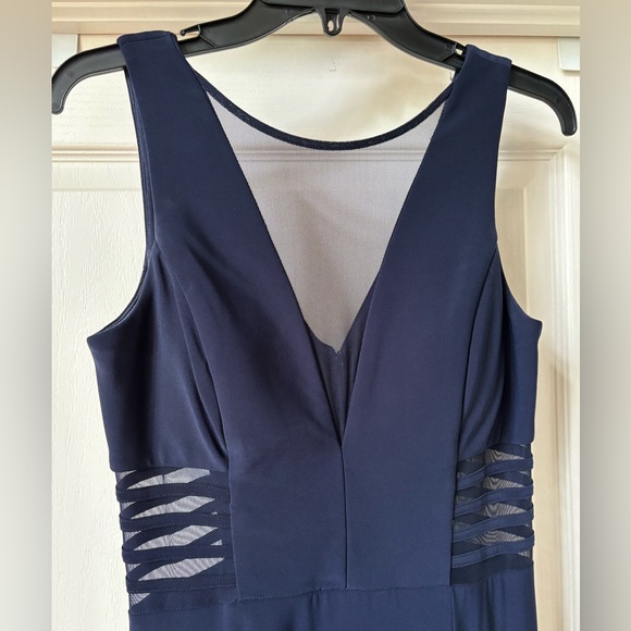 Navy blue fully lined ballgown with cutouts covered with navy, sheer mesh. - Picture 2 of 11